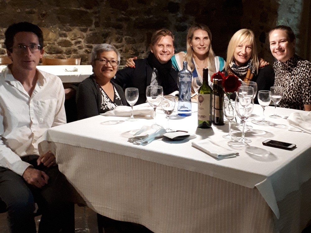 Spain group shot in restaurant in Monells