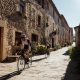 Cycling through the streets of Monells, Spain